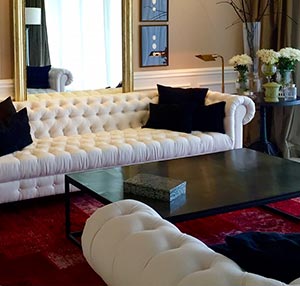 Red overdyed patchwork rug in living room